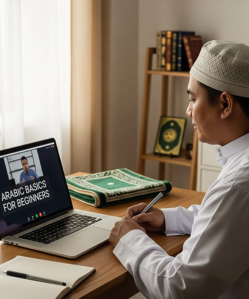 A Muslim man in a prayer cap attending an online "Arabic Grammar Course Online" class on his laptop, taking notes, highlighting the accessibility and purpose of learning Arabic grammar.
