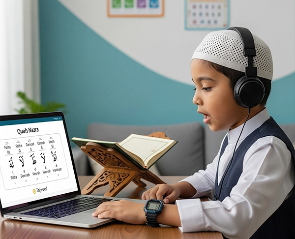 A young boy learning the Arabic alphabet and Harakaat on a laptop during his Nazra Quran course online.
